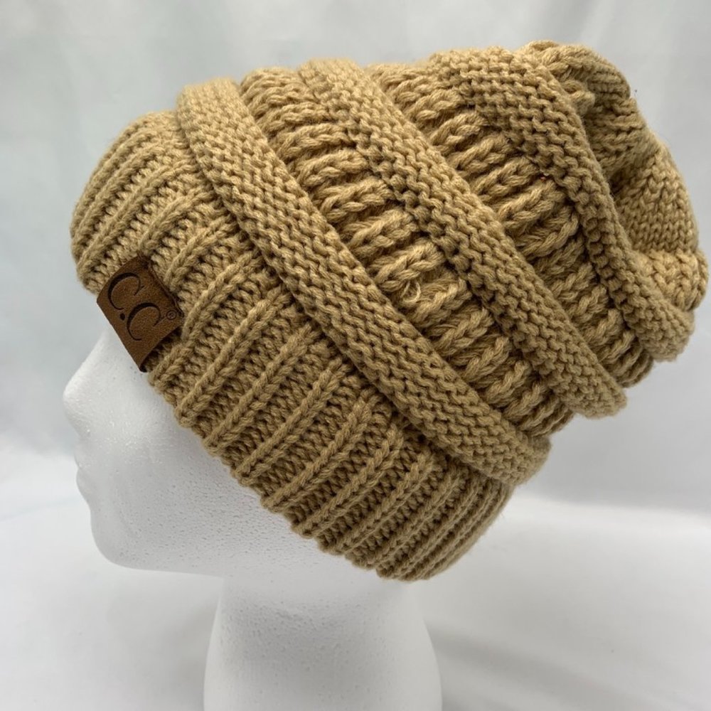 Tan/camel colored C.C beanie with ponytail hole